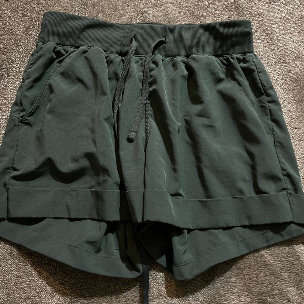 Dark green athletic shorts